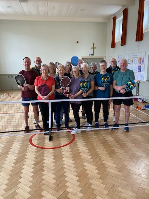 Some people about to play Pickleball