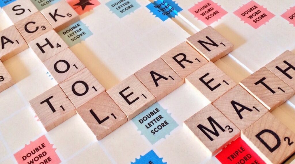Scrabble tiles on a Scrabble board